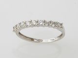 an 18k white gold diamond ring
