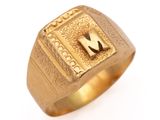 an image of a gold ring with a letter m on it