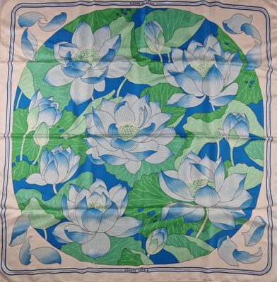 an image of a blue and green floral print scarf