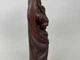 a statue of a woman holding a baby in her arms