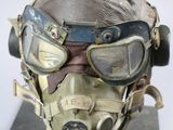 a helmet with goggles and a gas mask on it