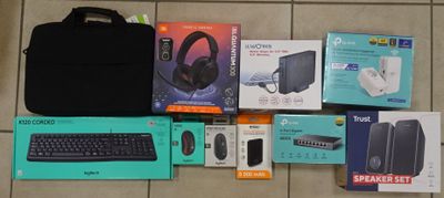 a lot of electronic items on the floor next to each other