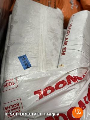 many bags of food sitting on top of each other