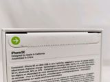 an iphone 5c box sitting on top of a white table