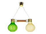 two green and white glass lamps hanging from a brass frame