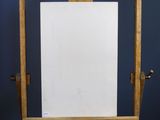 an old easel with a blank white board on a wooden stand
