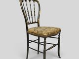an image of a chair with a floral upholstered seat