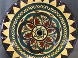 an image of a decorative plate on a table