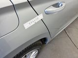 a sticker on the door of a car that has a sticker on it