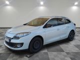 a picture of a white car parked in a garage