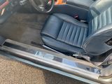an image of a car with the door open