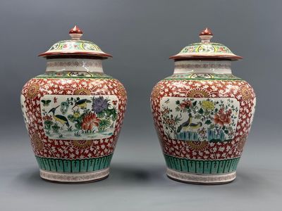 pair of chinese famille vases with lids