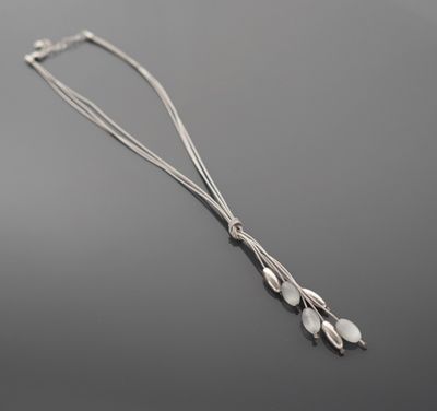 Collier en argent 925 millièmes présentant trois mailles tub…