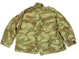 a close up of a military jacket on a white background