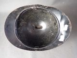 a metal object with a hole in the middle of it