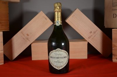 a bottle of wine that is sitting on a table
