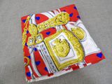 an image of a red and white square with a gold crown on it
