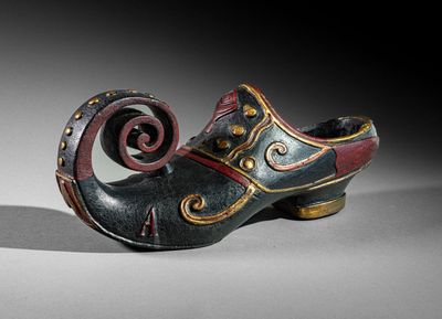 an image of a shoe with a spiral design on the side