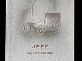 a picture of a jeep emblem on a white box