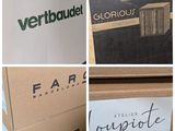four different views of a box with a logo on it and a box with a logo on it