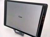a person holding a tablet with the word ciao on it