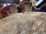 several empty wine glasses sitting on a table in a restaurant