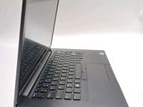 a laptop that is open and sitting on a table