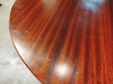 a close up of a table with a wooden top