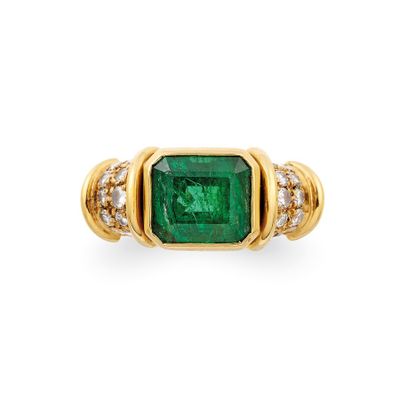 an emerald and diamond ring