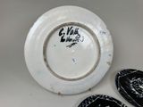 a white plate with a black and white design on it