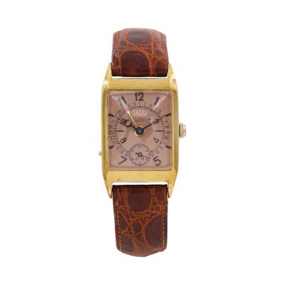 an image of a gold and brown watch on a white background