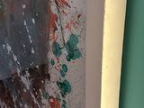a picture of a painting on the wall of a bathroom