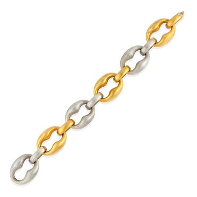 a gold and silver link bracelet on a white background
