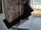 a plastic bag with a hammer inside of it