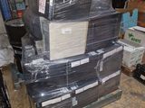 many boxes stacked on top of each other in a warehouse