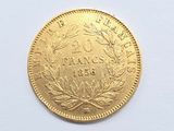 an image of a gold coin on a white surface
