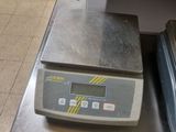 an image of a digital scale on a kitchen counter