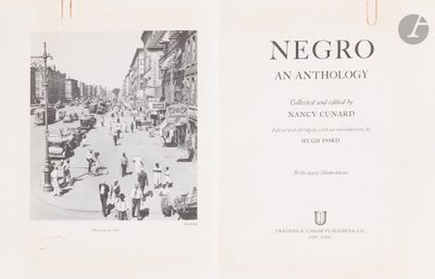 two pages of a book with a picture of a city street