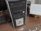 a desktop computer sitting on top of a wooden desk