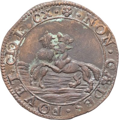 un gros plan d'une pièce de monnaie sur laquelle figurent un cheval et un cavalier