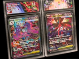 three different types of pokemon cards are displayed in a display case