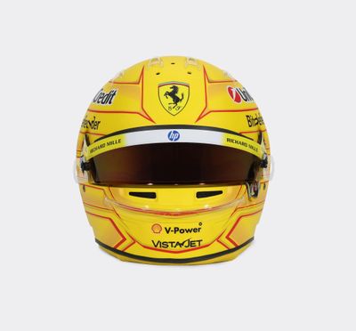the helmet of the driver of the ferrari team is shown