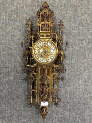 a clock on the wall that is hanging on the wall