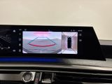 the view of a car ' s dashboard with a camera mounted to it ' s dashboard