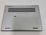 an open laptop computer sitting on top of a white table