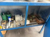 a shelf with various tools on it in a room