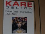 a sign with a picture of a woman with flowers in her hair