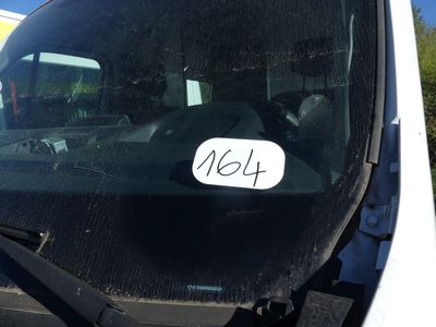 a sticker on the windshield of a van that says no 4