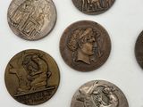 a lot of coins that are sitting on a table