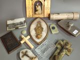 a collection of religious items displayed on a table